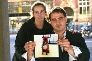 Anxious wait: Louise Dunn and partner Arthur Kalamaras are waiting to be reunited with their dog Rocket. Picture: Joe Armao/The Age  